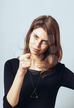 attractive woman showing fig gesture isolated