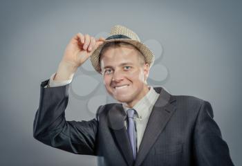 businessman in a funny hat and a funny haircut