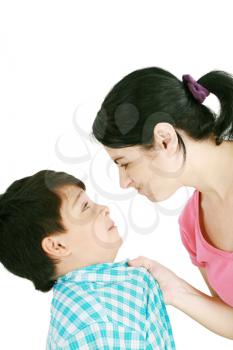 Boy confronts his mother isolated on white background 