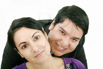 Close-up of beautiful young couple isolated on white background 
