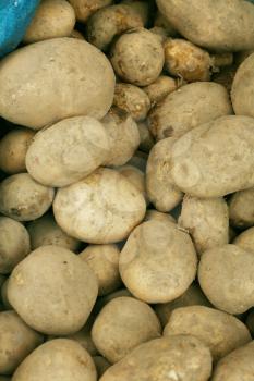 potatoes raw vegetables food pattern in market 
