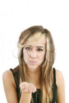 Portrait of a woman blowing a kiss against a white background 
