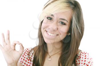 bright picture of lovely teenage girl showing ok sign 