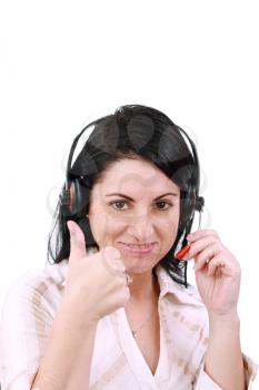 smiling call center young woman with a headset thumb up 

