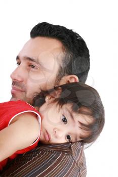 beautiful little girl hugging embracing her father.  Focus in the little girl.
