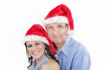Young happy lovely couple wishing a merry christmas