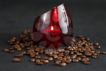 Royalty Free Photo of a Candle and Coffee Beans