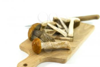 Royalty Free Photo of Mushrooms on a Cutting Board