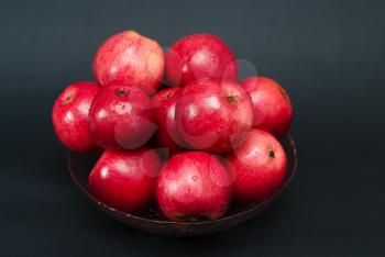 Royalty Free Photo of a Bowl of Pomegranates