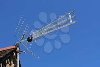 Digital terrestrial television antenna, over a blue sky