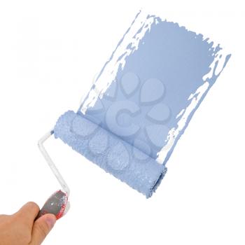 Royalty Free Photo of a Hand With a Roller Painting a Wall