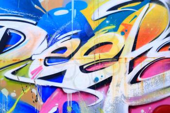 Detail of a colorful graffiti on a wall