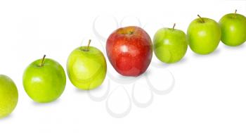 Standing out concept. Green apples row with red one isolated on white background.