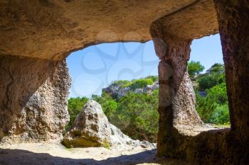 View from the inside of Cala Morell Necropolis Caves at Menorca, Spain.