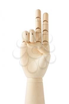 Royalty Free Photo of a Wooden Dummy's Hand With Two Fingers Pointing Up