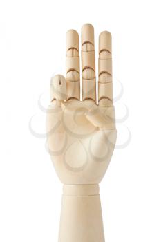 Royalty Free Photo of a Wooden Dummy With Three Fingers Pointing Up