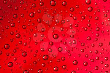 Royalty Free Photo of Water Drops on a Smooth Surface