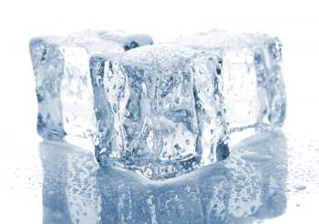 Royalty Free Photo of Three Melting Ice Cubes