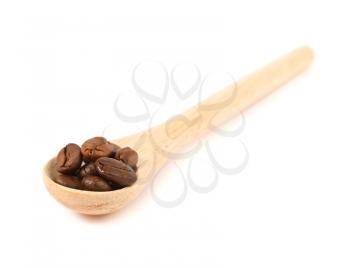 Royalty Free Photo of a Wooden Spoon with a Scoop of Coffee Beans