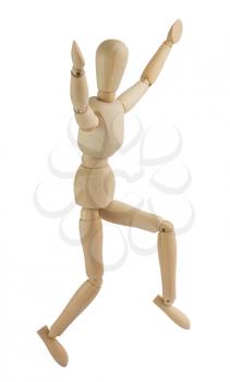 Royalty Free Photo of a Wooden Mannequin Jumping While Raising its Arms