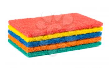 Stack of different color sponges isolated on a white background