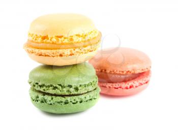 Colorful tasty macaroons isolated on white background