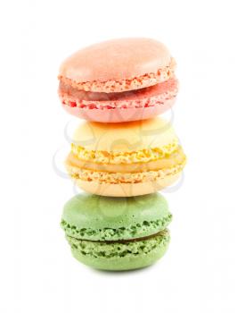 Stack of colorful macaroons on the white background