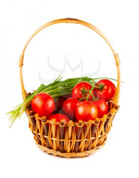 Royalty Free Photo of a Basket with Tomatoes and Green Onion