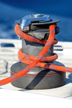 Royalty Free Photo of a Winch With a Rope on a Sailing Boat
