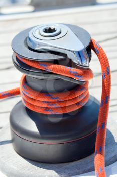Royalty Free Photo of a Winch With a Rope on a Sailing Boat