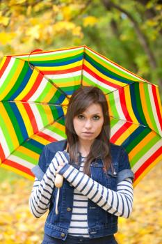 Royalty Free Photo of a Woman Holding a Umbrella