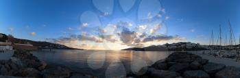 Sunrise in harbor of greek island Kythnos at Cyclades