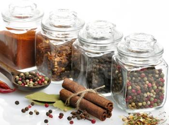 Royalty Free Photo of Spices Assortment in Glass Jars