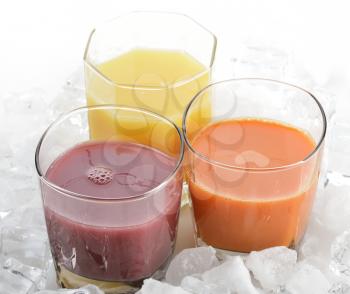 Fresh Fruit And Vegetable Juice With Ice Cubes