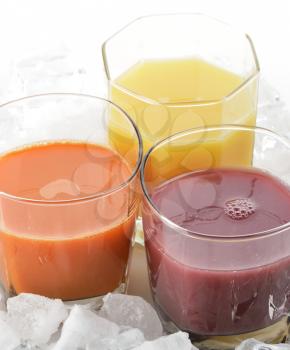 Fresh Fruit And Vegetable Juice With Ice Cubes