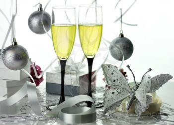 Glasses of champagne with christmas decorations 