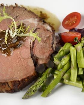 Slice Of Beef Roast With Asparagus