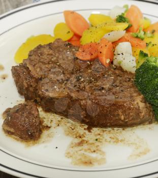 Plate Of Baked Beef With Vegetables