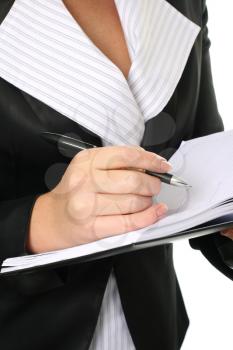 Businesswoman write in notebook
