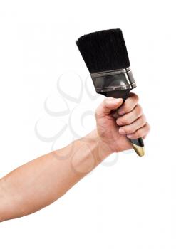 Brush in  hand isolated on a white background 