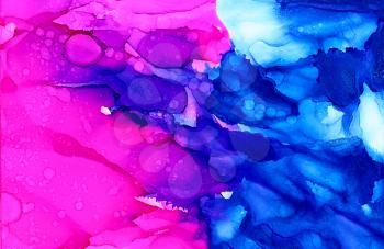 Abstract bright pink with textured blue.Colorful background hand drawn with bright inks and watercolor paints. Color splashes and splatters create uneven artistic modern design.