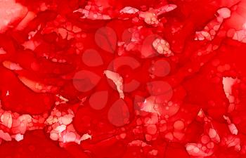 Abstract bright textured red.Colorful background hand drawn with bright inks and watercolor paints. Color splashes and splatters create uneven artistic modern design.