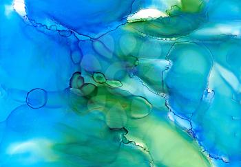 Abstract liquid painted green blue.Colorful background hand drawn with bright inks and watercolor paints. Color splashes and splatters create uneven artistic modern design.