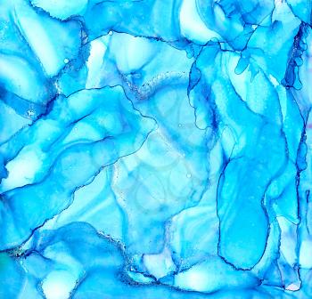 Abstract painted blue uneven.Colorful background hand drawn with bright inks and watercolor paints. Color splashes and splatters create uneven artistic modern design.