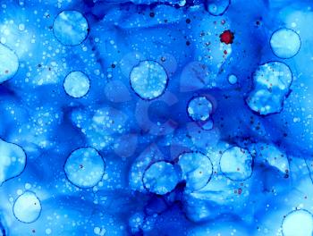 Abstract raster splattered light blue with stains.Colorful background hand drawn with bright inks and watercolor paints. Color splashes and splatters create uneven artistic modern design.
