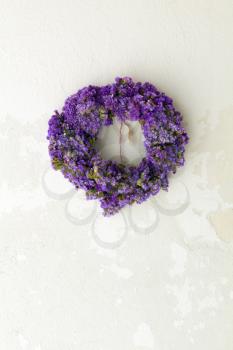 flower wreath on white wall - greece
