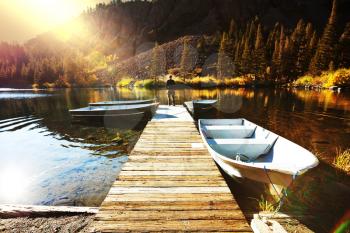 Royalty Free Photo of a Dock in Autumn Lake