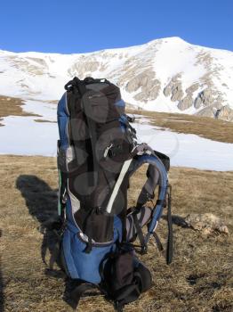 Royalty Free Photo of a Backpack in the Mountains