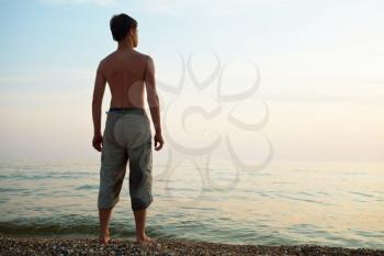 Royalty Free Photo of a Boy on the Beach