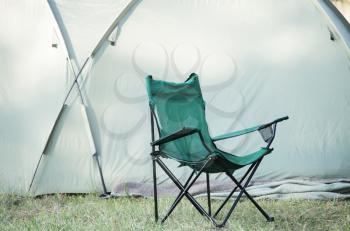 Royalty Free Photo of a Tent and Camp Chair